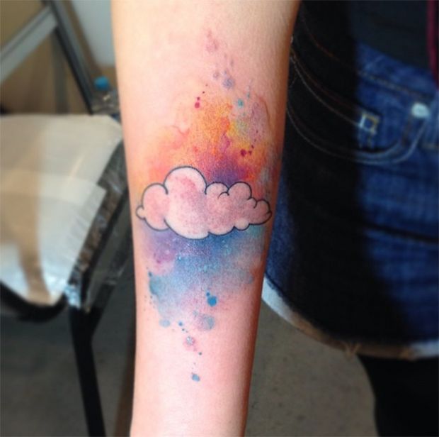 Simple Watercolor Cloud Tattoo Design For Forearm