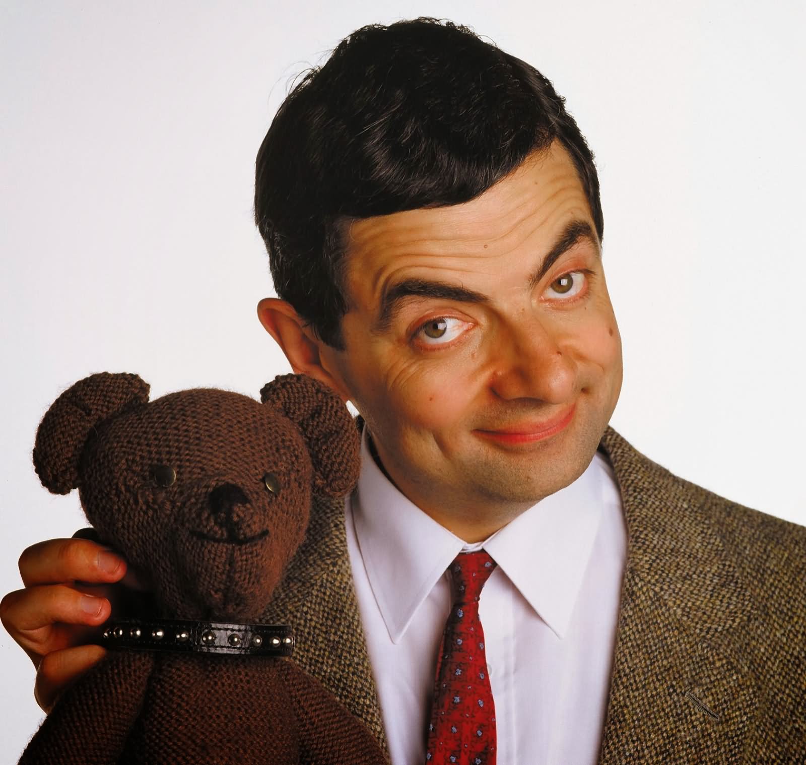 Smiling Mr Bean With Teddy Funny Image