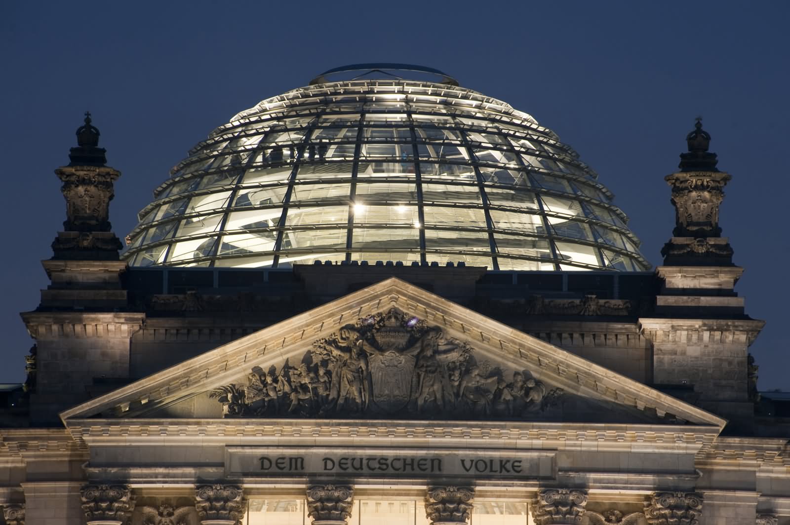 The Dome On The Top Of The Reichstag Building In Berlin At Night