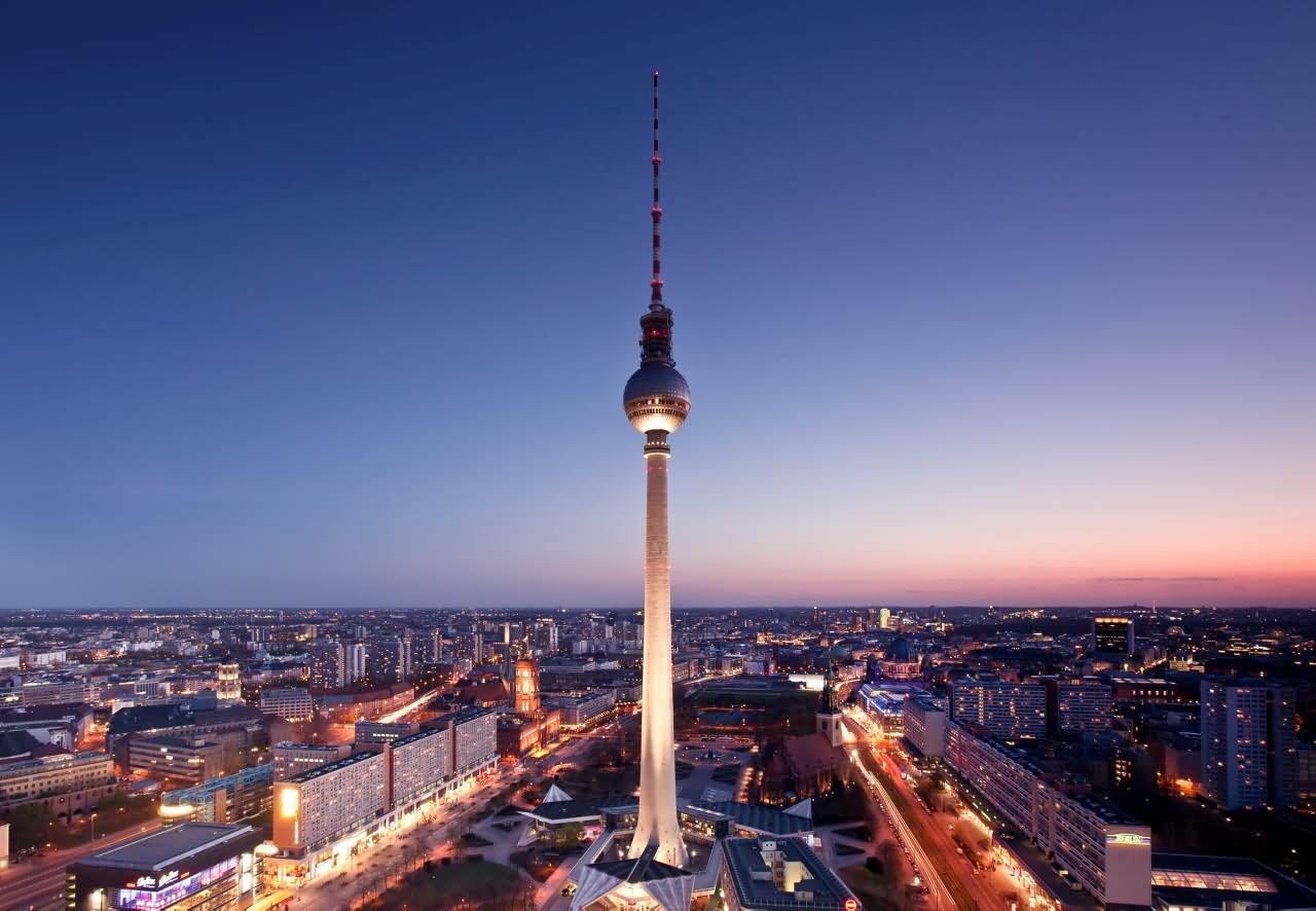 The Fernsehturm Tower Illuminated In Berlin