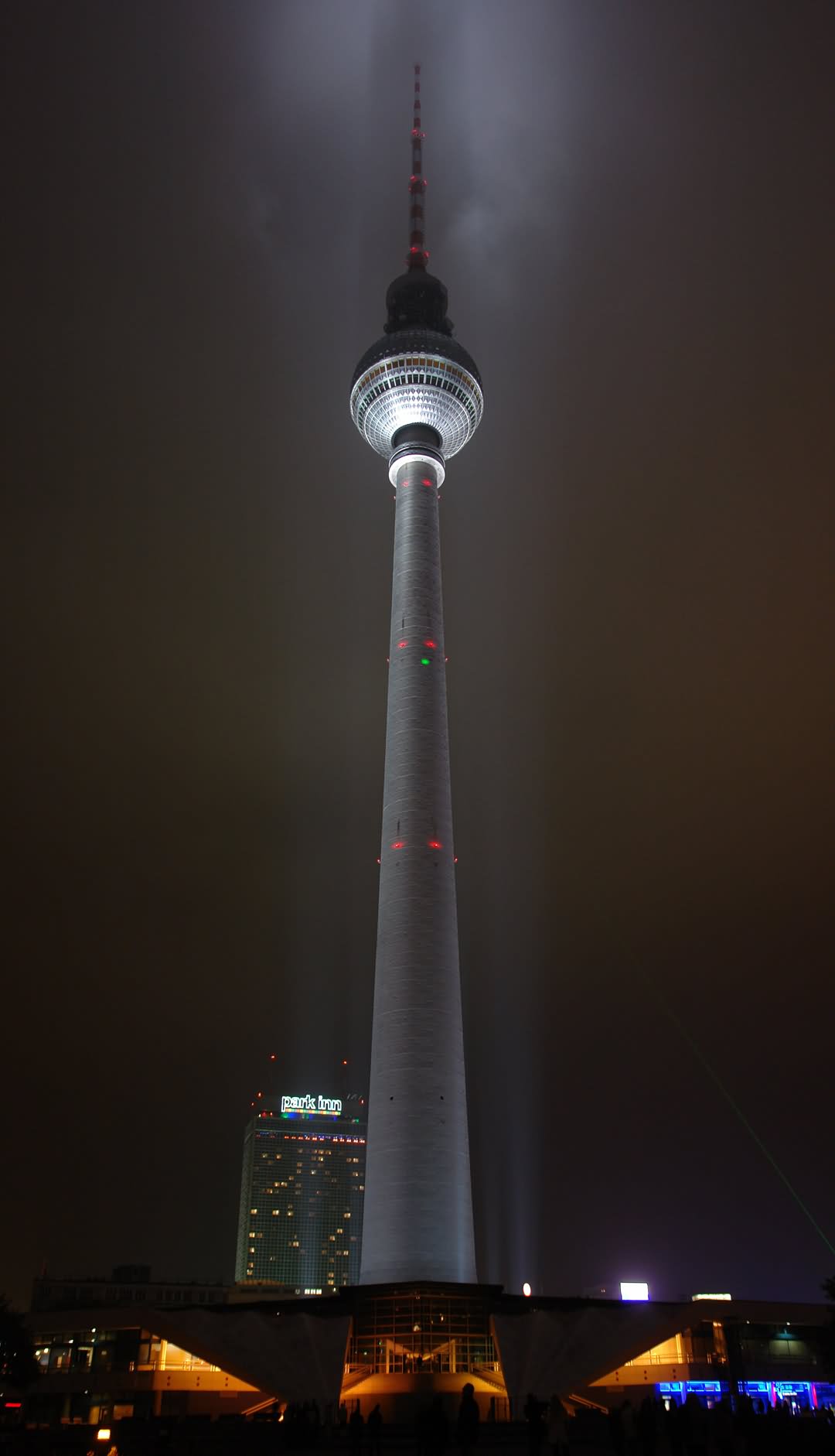 The Fernsehturm Tv Tower Lit Up At Night