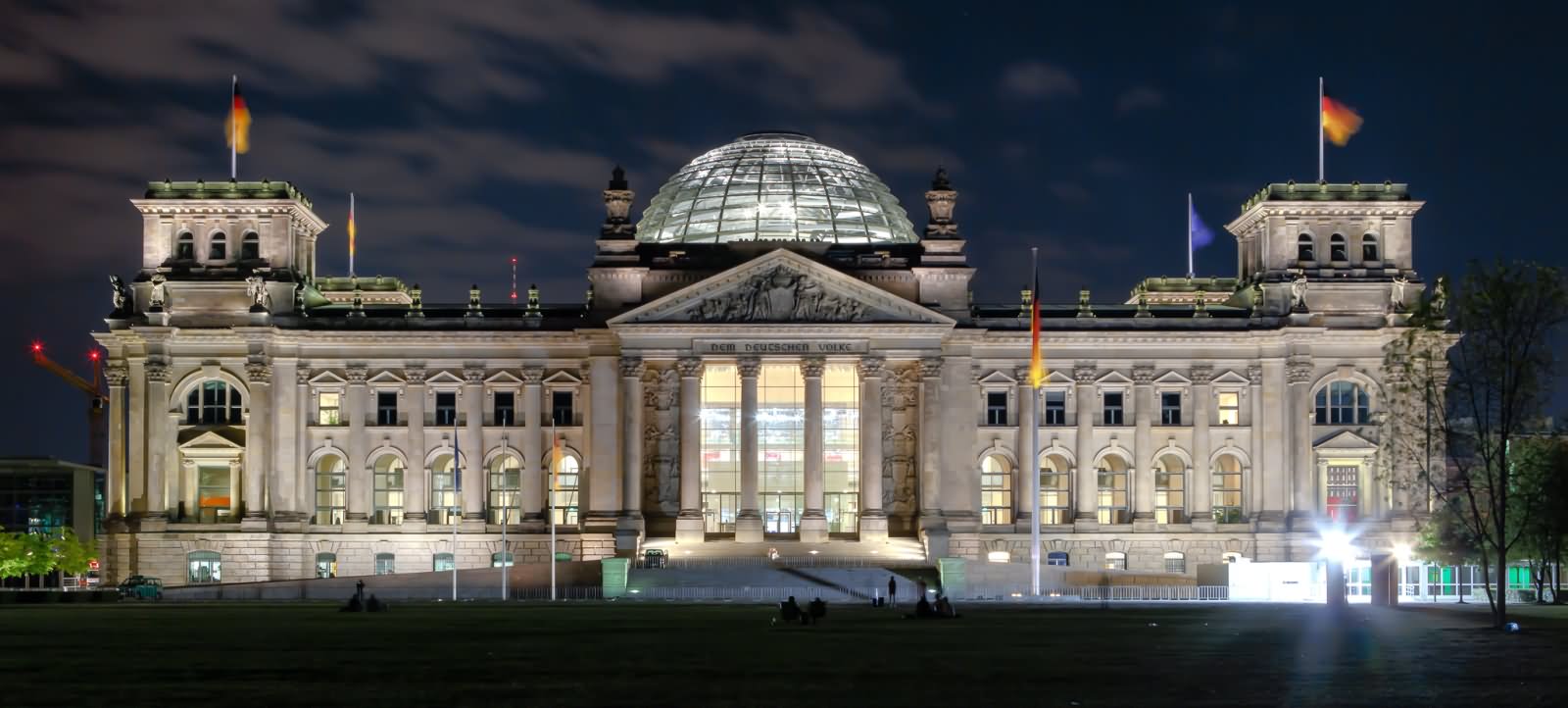 The Reichstag Building And Dome Illuminated At Night