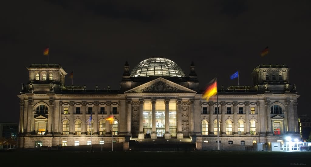 The Reichstag Building In Berlin, Germany Illuminated At Night