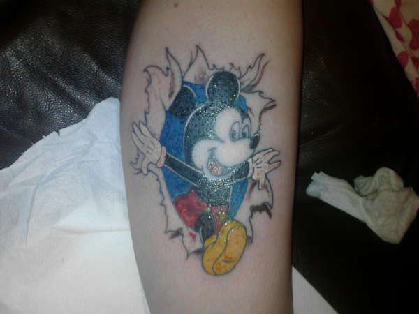 Torn Ripped Skin Mickey Mouse Tattoo On Leg