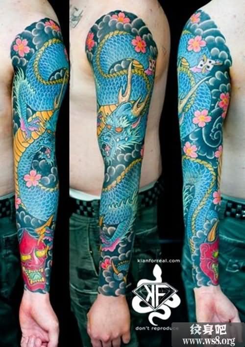 Traditional Dragon With Flowers Tattoo On Man Left Full Sleeve