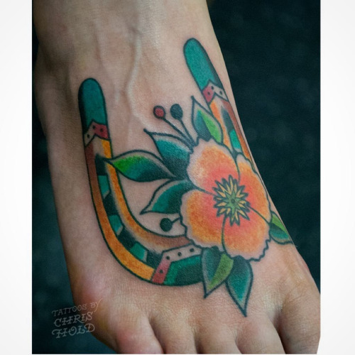 Traditional Horseshoe With Flower Tattoo On Right Foot