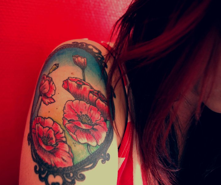 Traditional Poppy Flowers In Frame Tattoo On Girl Right Shoulder