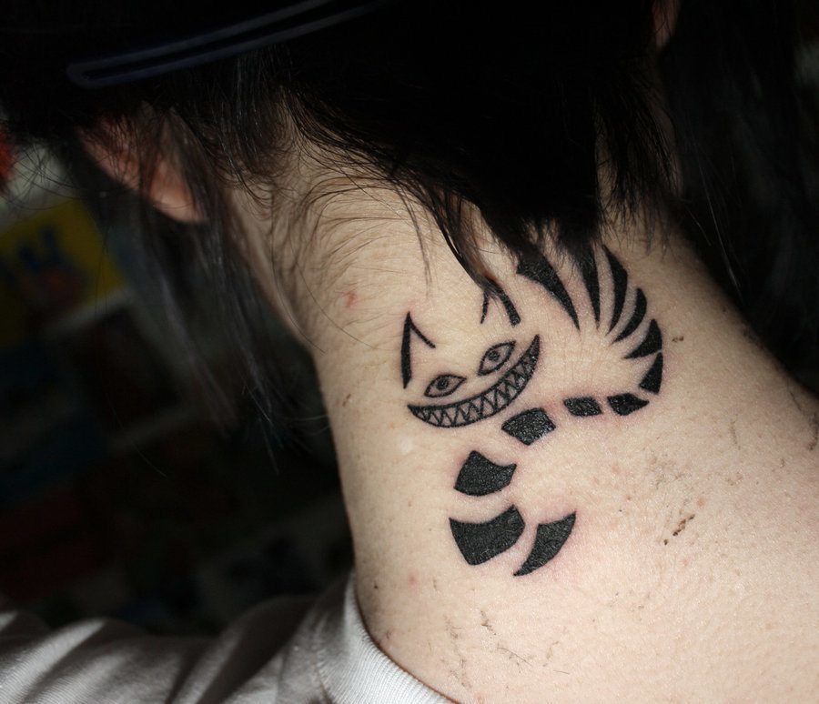 Tribal Cheshire Cat Tattoo On Back Neck