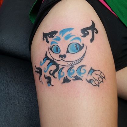 Tribal Cheshire Cat Tattoo On Right Thigh by Steph95e