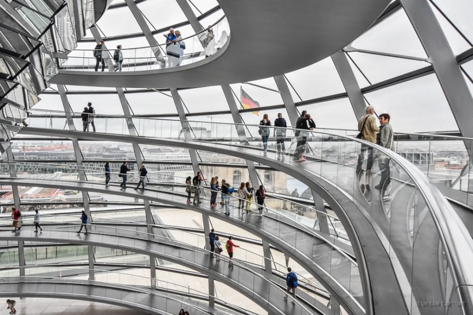Visitors Walking Inside The Glass Dome Of Reichstag In German
