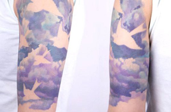 Watercolor Clouds With Flying Birds Tattoo On Half Sleeve