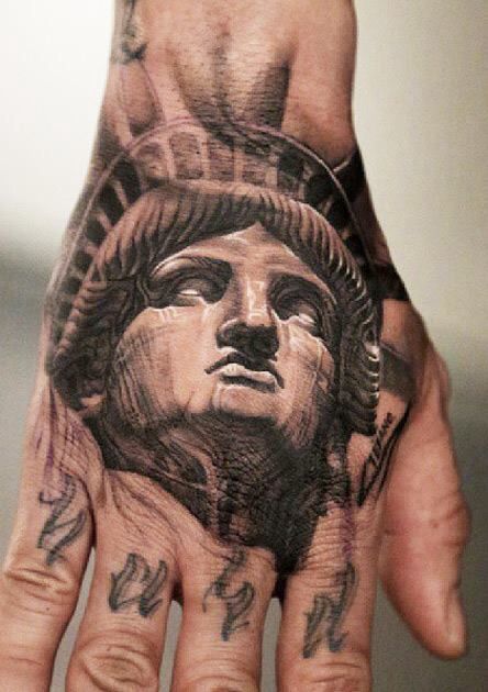 3D Statue Of Liberty Face Tattoo On Right Hand By Stefano Alcantara