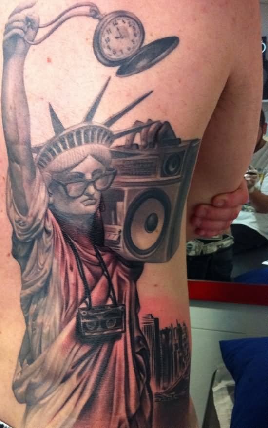 3D Statue Of Liberty With Radio And Pocket Watch Tattoo On Back
