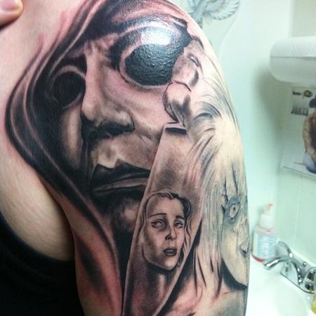 Black And Grey Ripped Skin Horror Portrait Tattoo Design For Shoulder