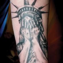 Black And Grey Statue Of Liberty Tattoo Design For Sleeve