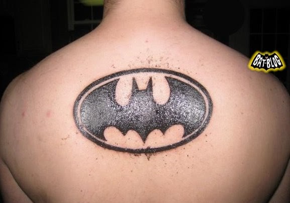 Black Batgirl Symbol Tattoo On Upper Back