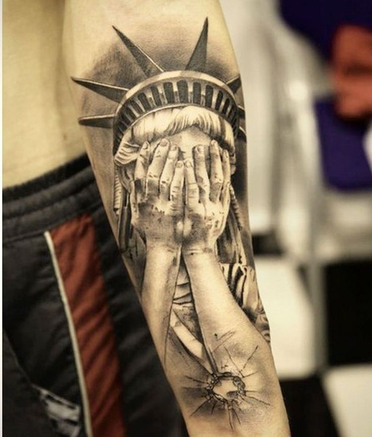 Grey Ink 3D Crying Statue Of Liberty Tattoo On Forearm