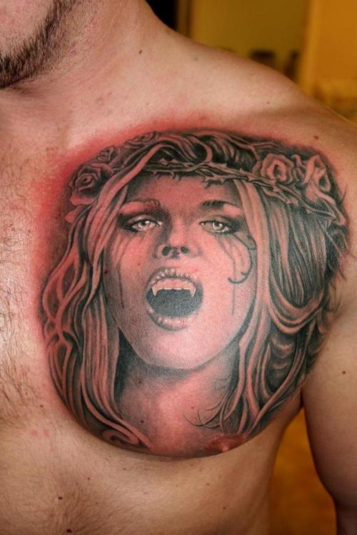Horror Vampire Girl Face Tattoo On Man Chest