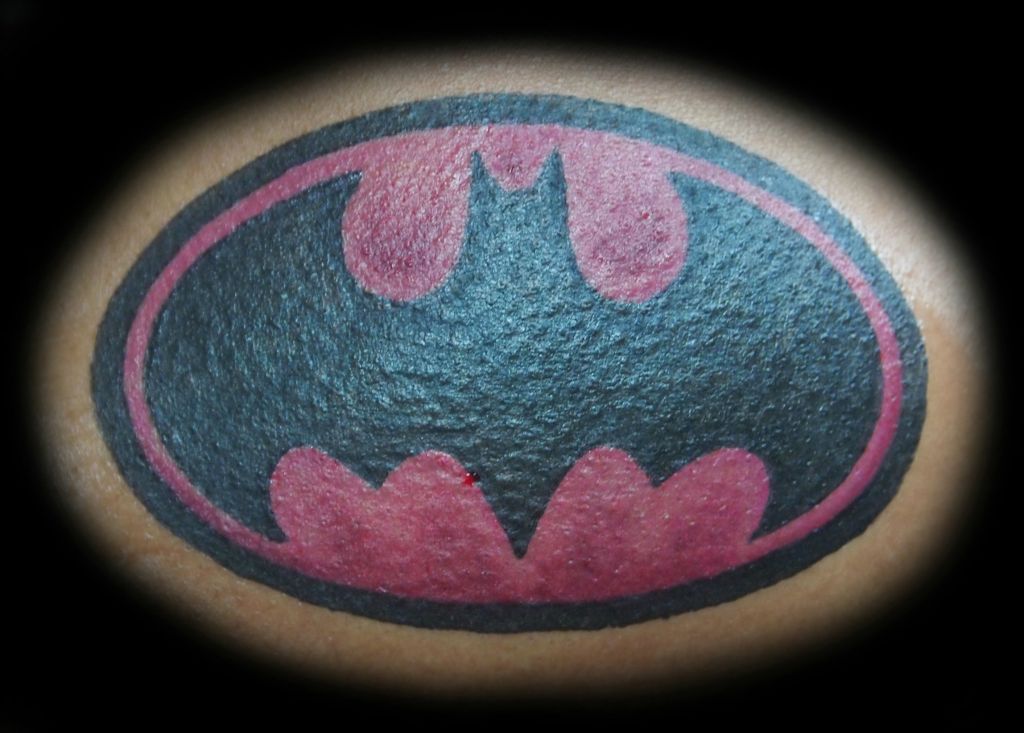 Pink And Black Batgirl Symbol Tattoo Design