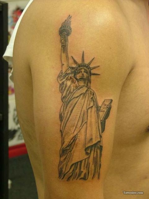 Statue Of Liberty Tattoo On Man Right Half Sleeve