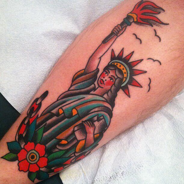 Traditional Statue Of Liberty Girl With Flower Tattoo Design For Sleeve By Jeremy Whitley