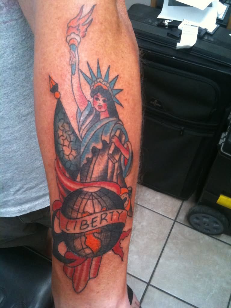 Traditional Statue Of Liberty Girl With USA Flag And Globe Tattoo Design For Arm By Gabe Garcia