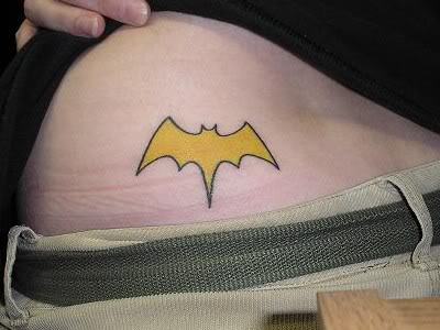 Yellow Batgirl Symbol Tattoo Design For Lower Back