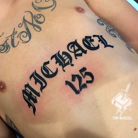 125 - Michael Name Tattoo On Man Stomach