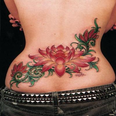 Amazing Lotus Flowers Tattoo On Girl Lower Back