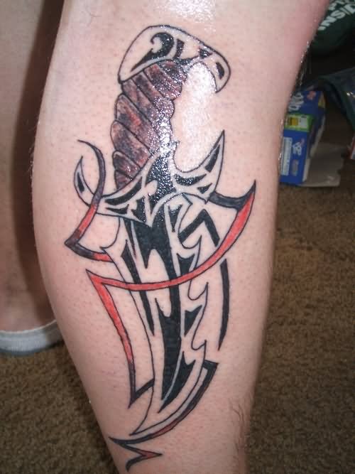 Amazing Tribal Knife Tattoo On Right Side Leg Calf