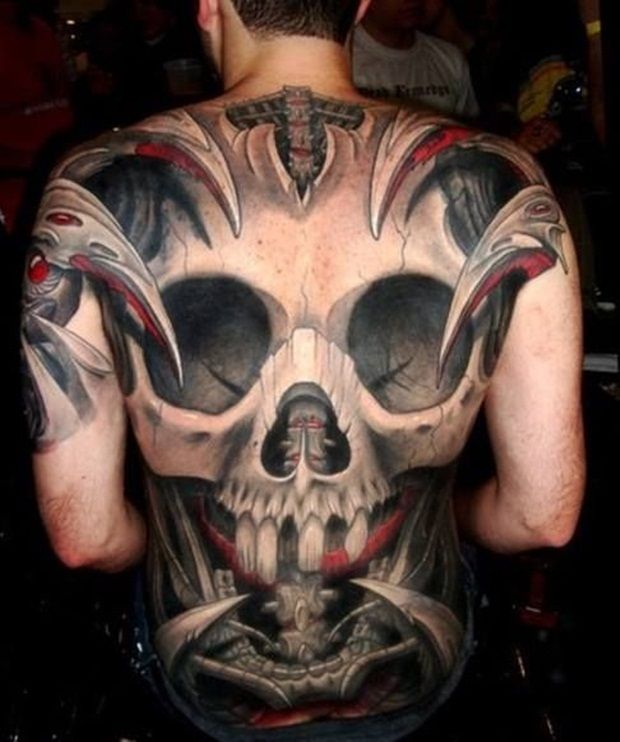 Attractive 3D Skull Tattoo On Man Full Back