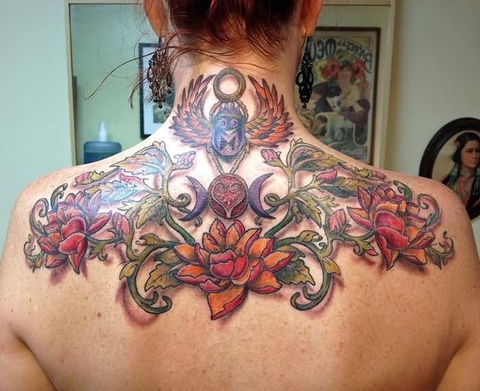 Attractive Colorful Flowers Tattoo On Girl Upper Back