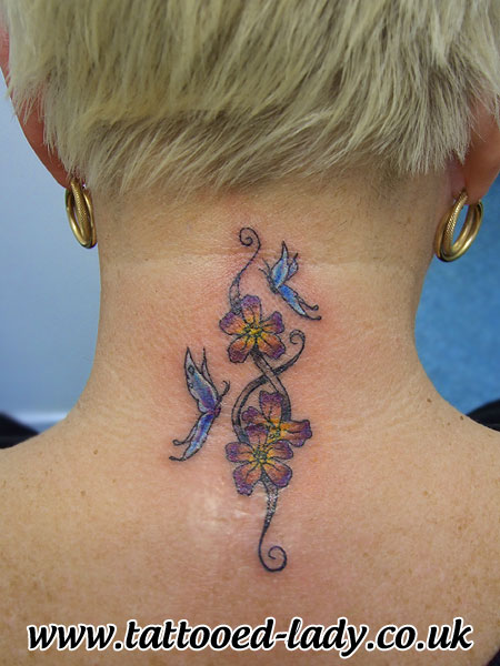 Attractive Flowers With Butterflies Tattoo On Back Neck
