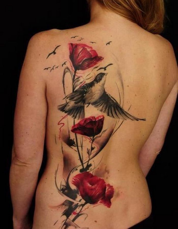 Attractive Flowers With Flying Bird Tattoo On Back