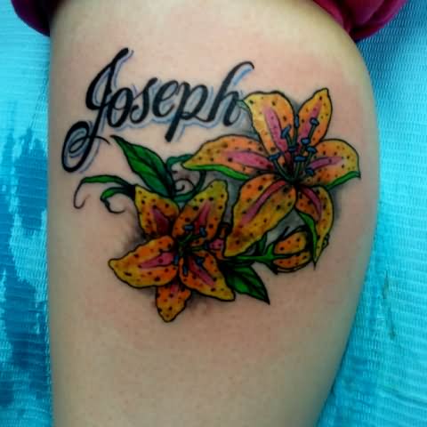 Attractive Flowers With Joseph Name Tattoo Design For Leg Calf
