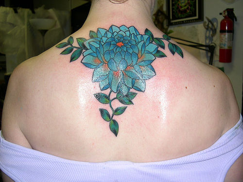 Awesome Dahlia Flower Tattoo On Upper Back