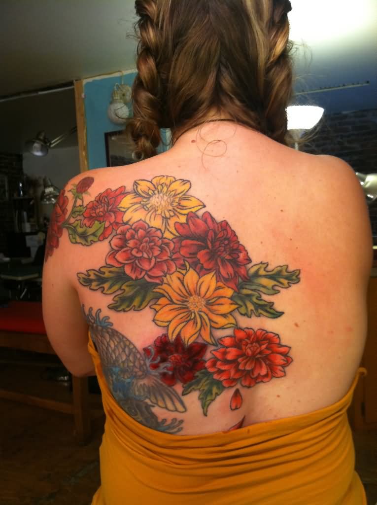 Awesome Dahlia Flowers Tattoo On Girl Upper Back