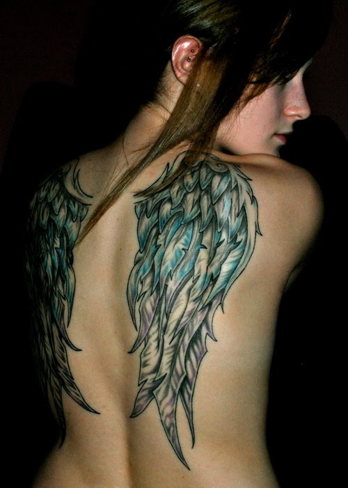 Black And Grey Angel Wings Tattoo On Girl Upper Back
