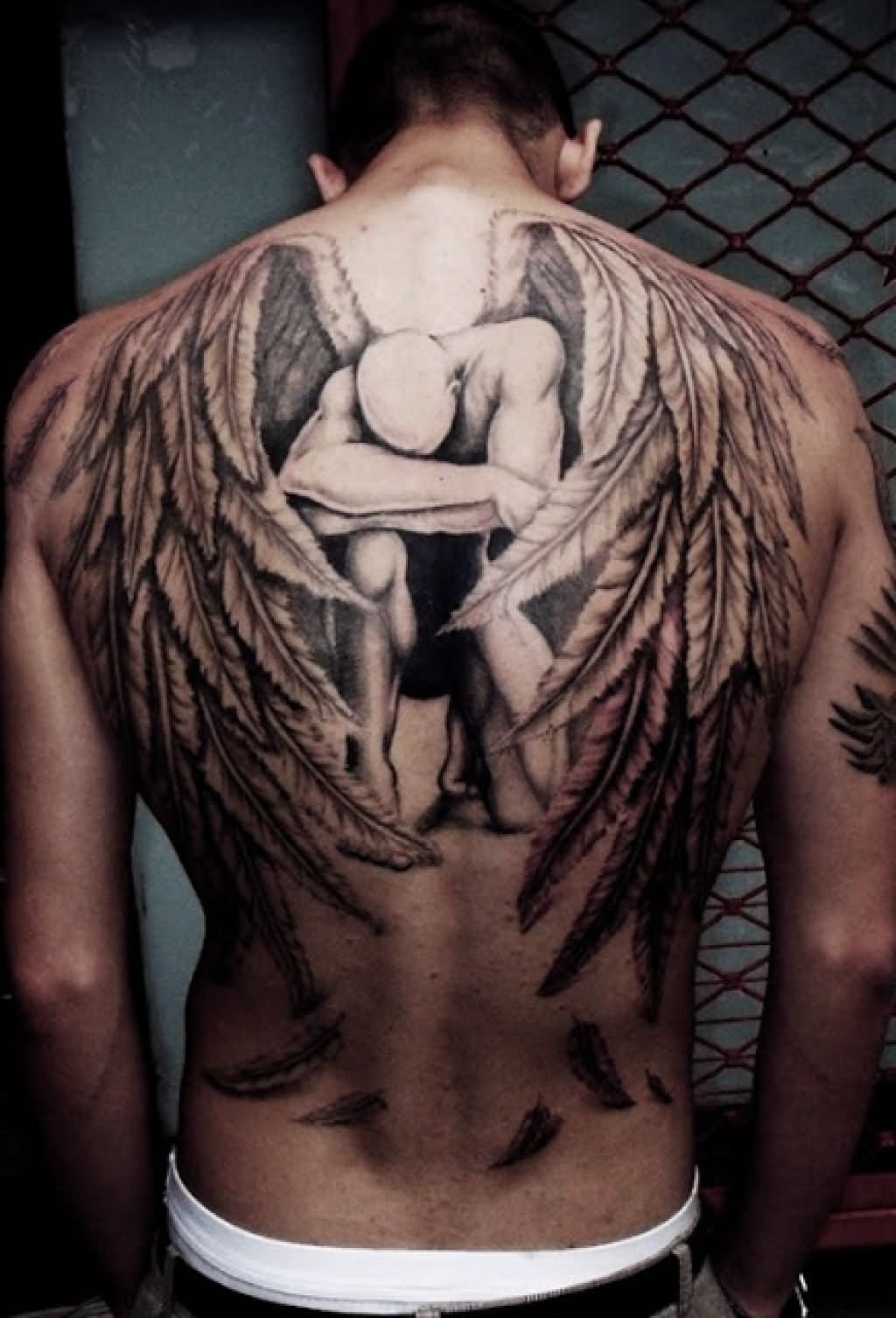 Black And Grey Angel With Wings Tattoo On Back