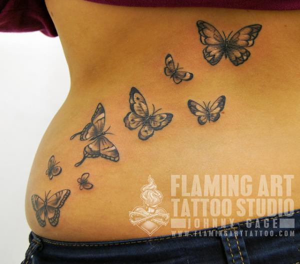 Black And Grey Butterflies Tattoo On Lower Back