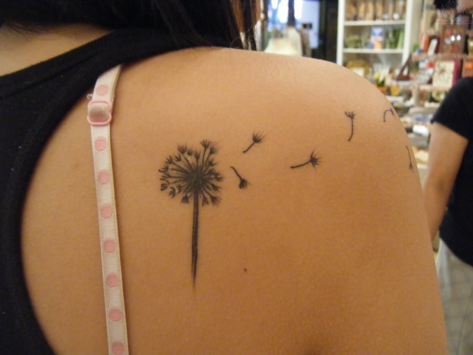 Black And Grey Dandelion Tattoo On Right Back Shoulder