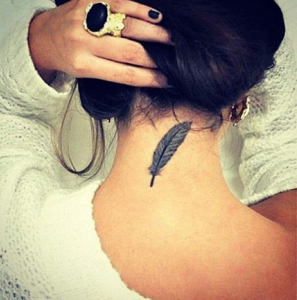 Black And Grey Feather Tattoo On Women Back Neck