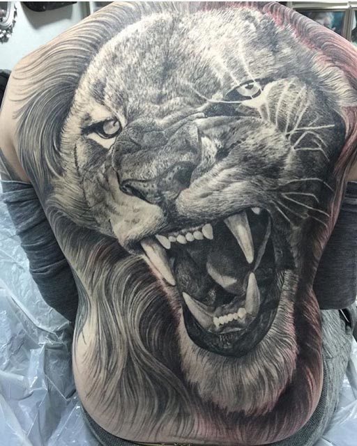 Black And Grey Roaring Lion Head Tattoo On Full Back