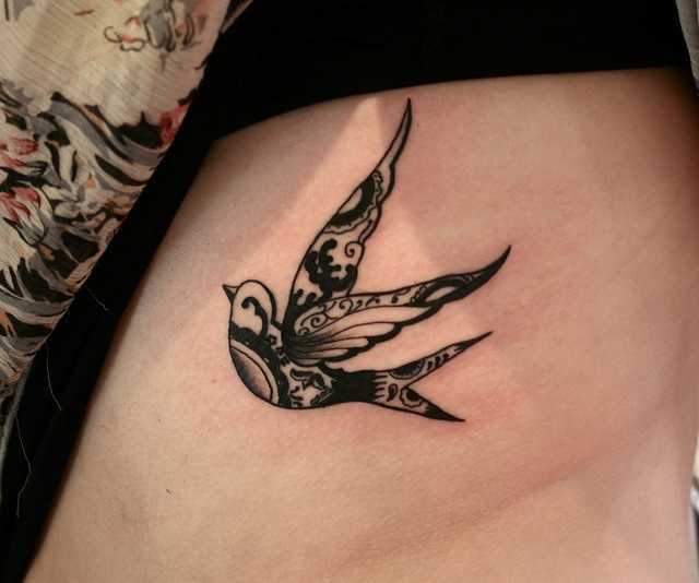 Black And Grey Sparrow Tattoo On Rib Side