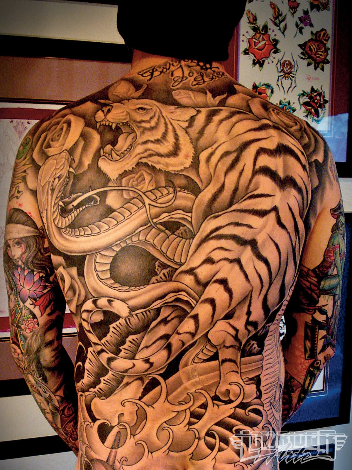 Black And Grey Tiger With Snake Tattoo On Full Back