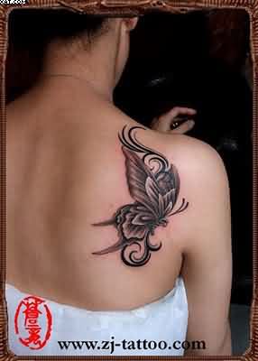 Black Ink Butterfly Tattoo On Women Right Back Shoulder