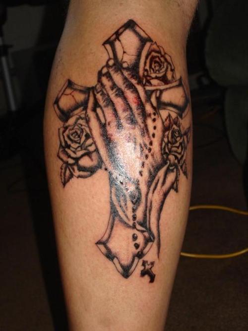 Black Ink Cross With Roses And Praying Hand Tattoo Design For Leg Calf