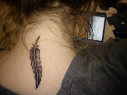 Black Ink Feather Tattoo On Girl Back Neck