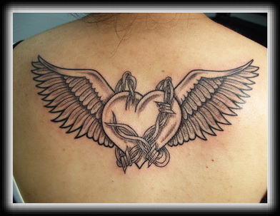 Black Ink Heart With Wings Tattoo On Upper Back