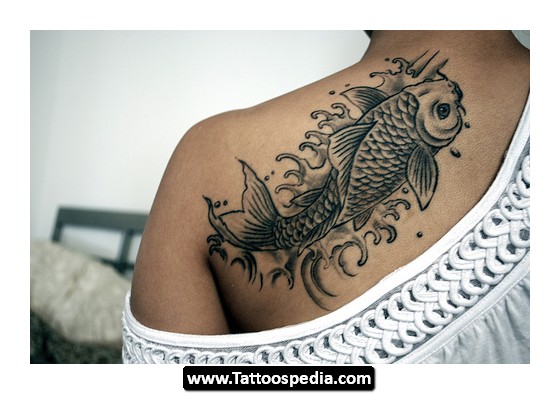Black Ink Koi Fish Tattoo On Women Left Back Shoulder